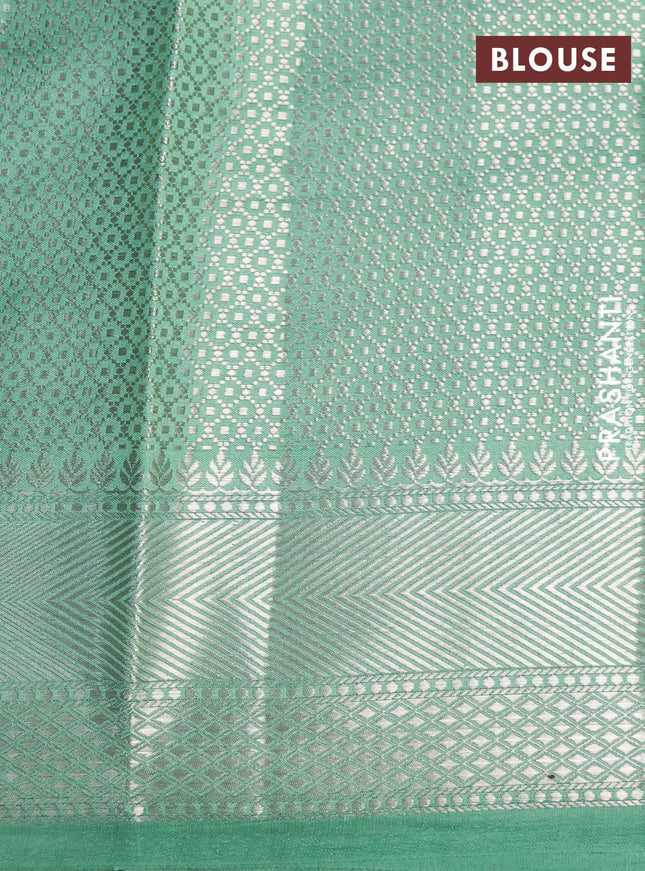 Chiniya silk saree teal green shade with allover zari weaves and zari woven border