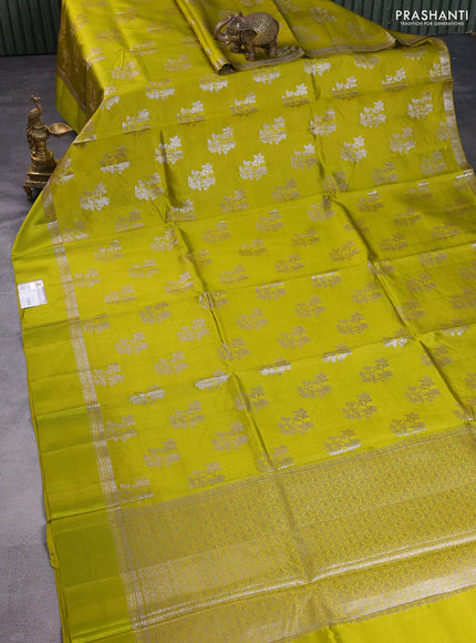 Chiniya silk saree lime yellow with silver zari woven buttas and silver zari woven simple border