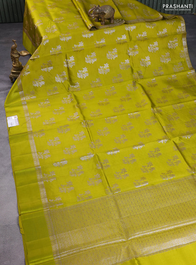 Chiniya silk saree lime yellow with silver zari woven buttas and silver zari woven simple border