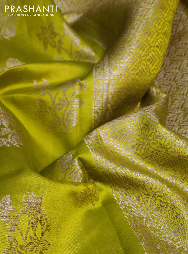 Chiniya silk saree lime yellow with silver zari woven buttas and silver zari woven simple border