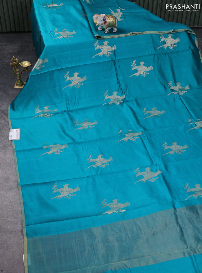 Chiniya silk saree teal green and magenta pink with parrot zari woven buttas and zari woven piping border