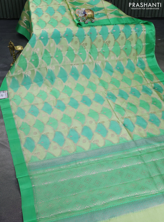 Banarasi poona silk saree light green and green with allover zari weaves and simple border
