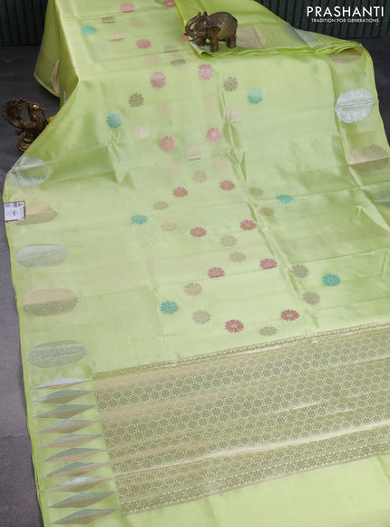 Banarasi poona silk saree pista green with zari woven floral buttas and zari woven butta border