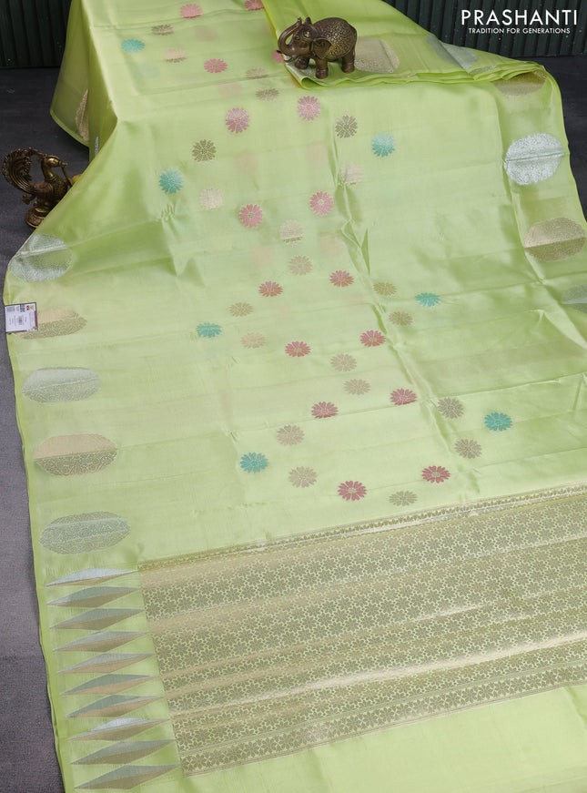 Banarasi poona silk saree pista green with zari woven floral buttas and zari woven butta border