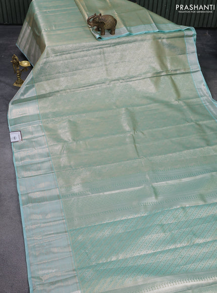 Bangalori tissue silk saree teal shade with allover zari woven brocade weaves and zari woven border