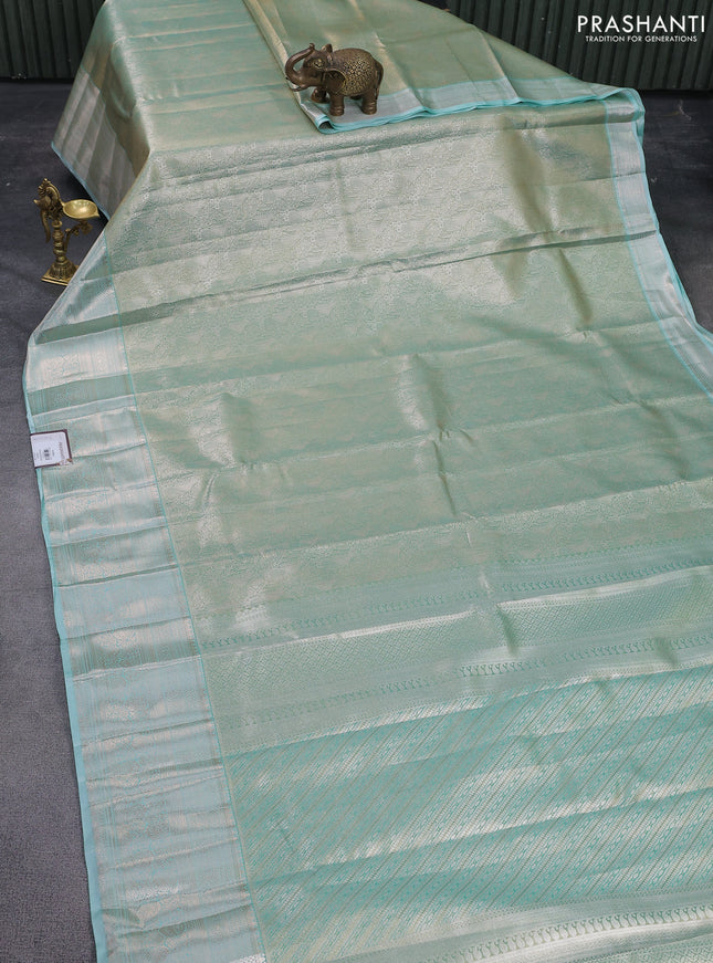 Bangalori tissue silk saree teal shade with allover zari woven brocade weaves and zari woven border
