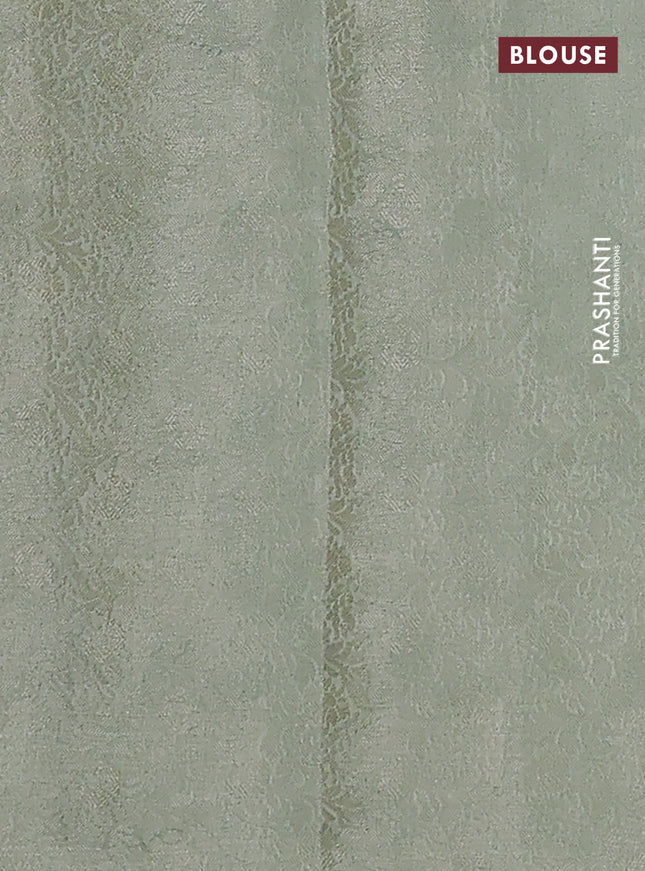 Chiniya silk saree off white and pastel green with allover silver zari buttas & digital prints and zari woven border