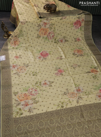 Chiniya silk saree pale yellow and elaichi green with allover woven buttas & digital prints and banarasi style border