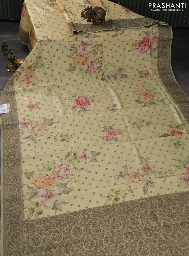 Chiniya silk saree pale yellow and elaichi green with allover woven buttas & digital prints and banarasi style border