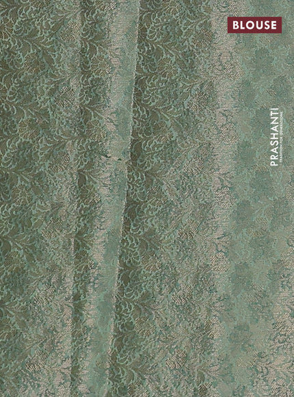 Chiniya silk saree rust shade and pastel green with zari woven buttas & digital prints and zari woven border