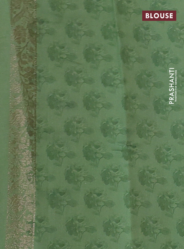 Chiniya silk saree rust shade and pastel green with zari woven buttas & digital prints and zari woven border