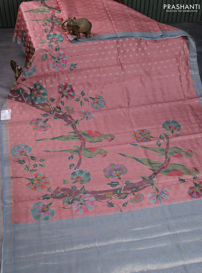 Chiniya silk saree peach shade and pastel blue with woven buttas & digital prints and zari woven border