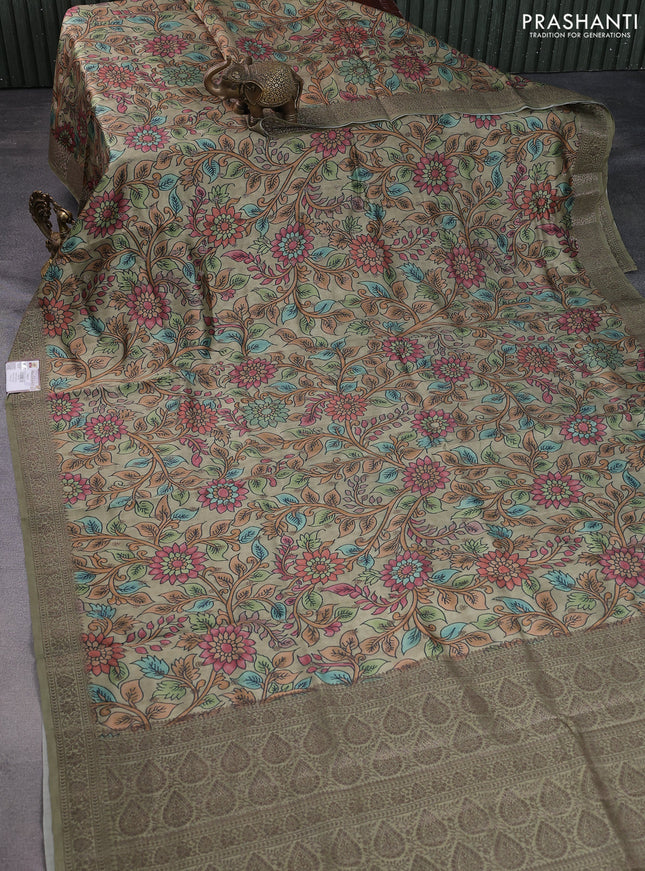 Chiniya silk saree pastel green with allover woven buttas & kalamkari digital prints and banarasi style border