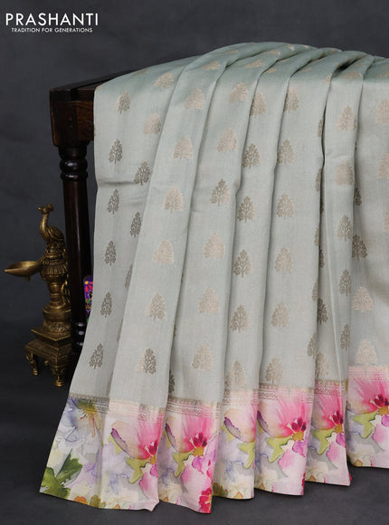 Chiniya silk saree pastel shade with allover zari woven buttas and floral digital printed border