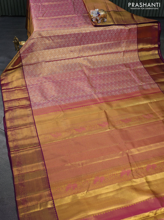 Pure kanchipuram tissue silk saree dual shade of gold and purple with allover zari woven brocade weaves and long zari woven border