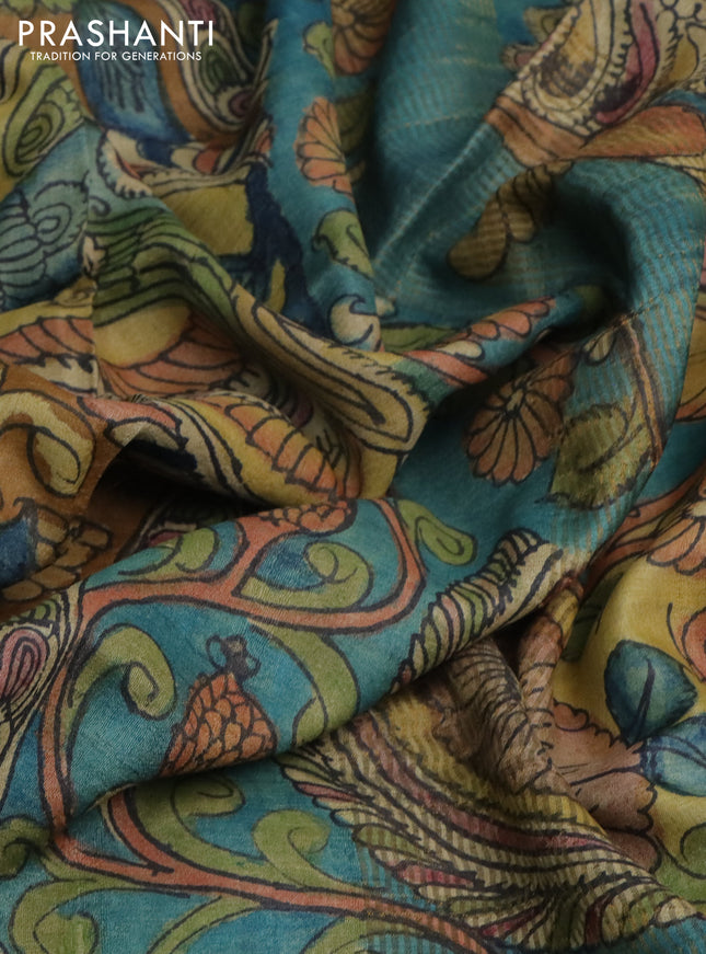 Pure tussar silk saree dark mustard and peacock blue with allover pen kalamkari prints and zari woven border