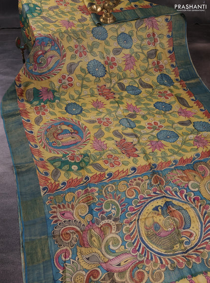 Pure tussar silk saree yellow shade and peacock blue with allover pen kalamkari prints and zari woven border