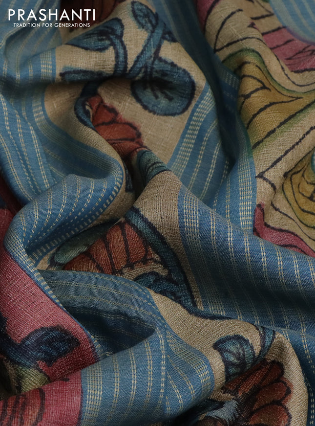 Pure tussar silk saree peach shade and cs blue with allover pen kalamkari prints and temple woven border
