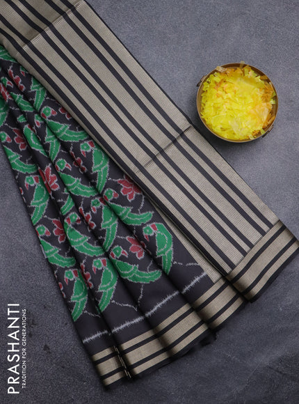Semi patola saree black with allover ikat prints and simple border