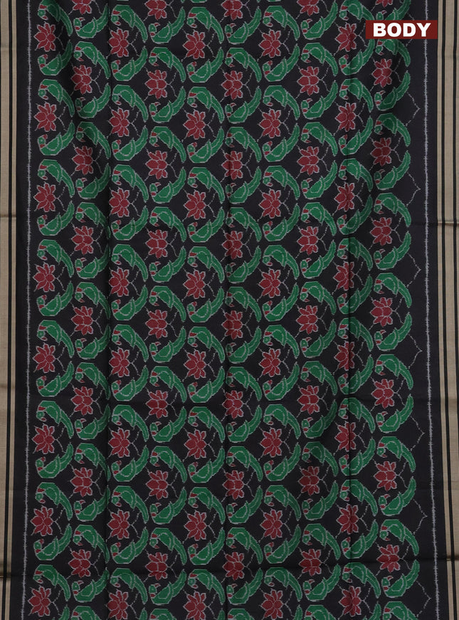 Semi patola saree black with allover ikat prints and simple border