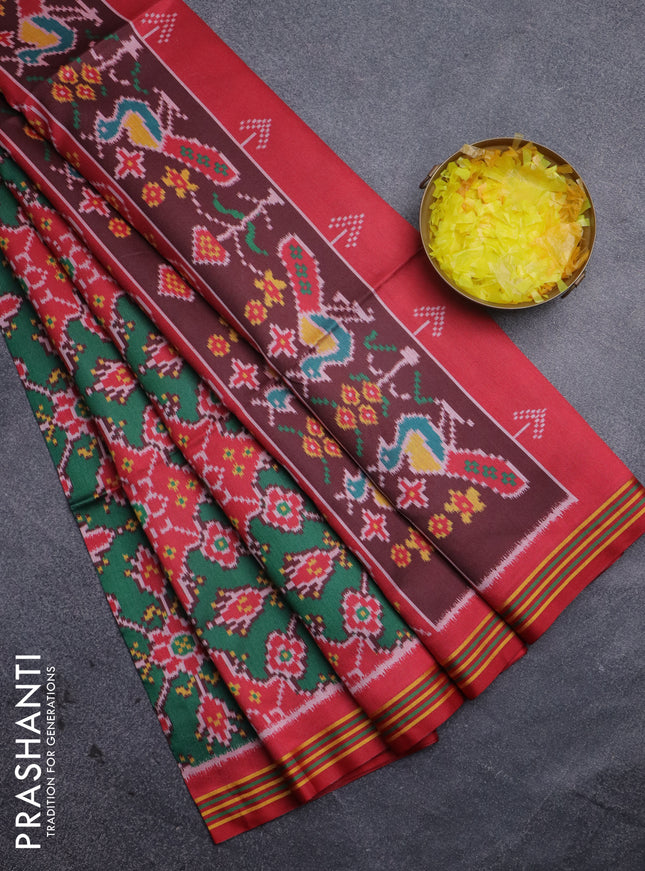 Semi patola saree green and maroon with allover ikat prints and simple border