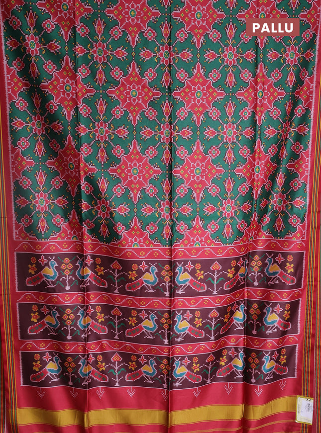Semi patola saree green and maroon with allover ikat prints and simple border