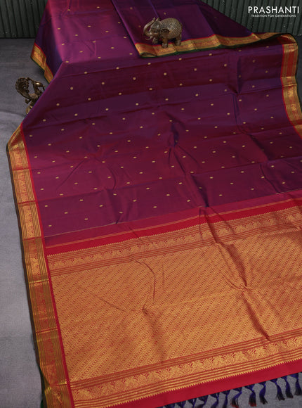 Pure kanchipuram silk saree dual shade of maroon and maroon green with zari woven buttas and zari woven border