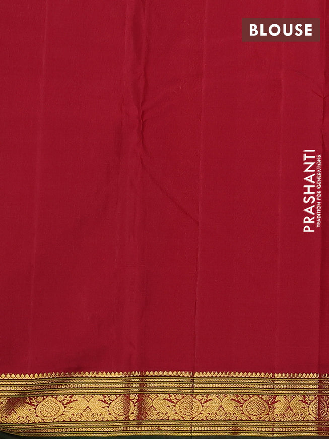 Pure kanchipuram silk saree dual shade of maroon and maroon green with zari woven buttas and zari woven border