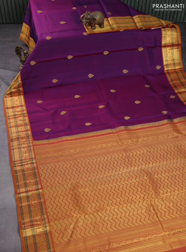 Pure kanchipuram silk saree purple shade and dark mustard with zari woven buttas and zari woven korvai border