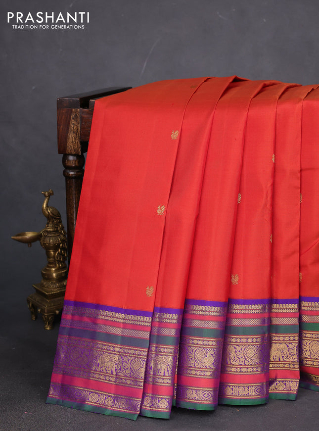 Pure kanchipuram silk saree rust shade and violet with zari woven buttas and rich zari woven korvai border