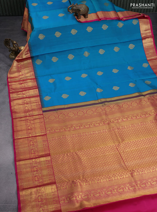 Pure kanchipuram silk saree dual shade of teal greenis blue and pink with zari woven buttas and temple design zari woven border