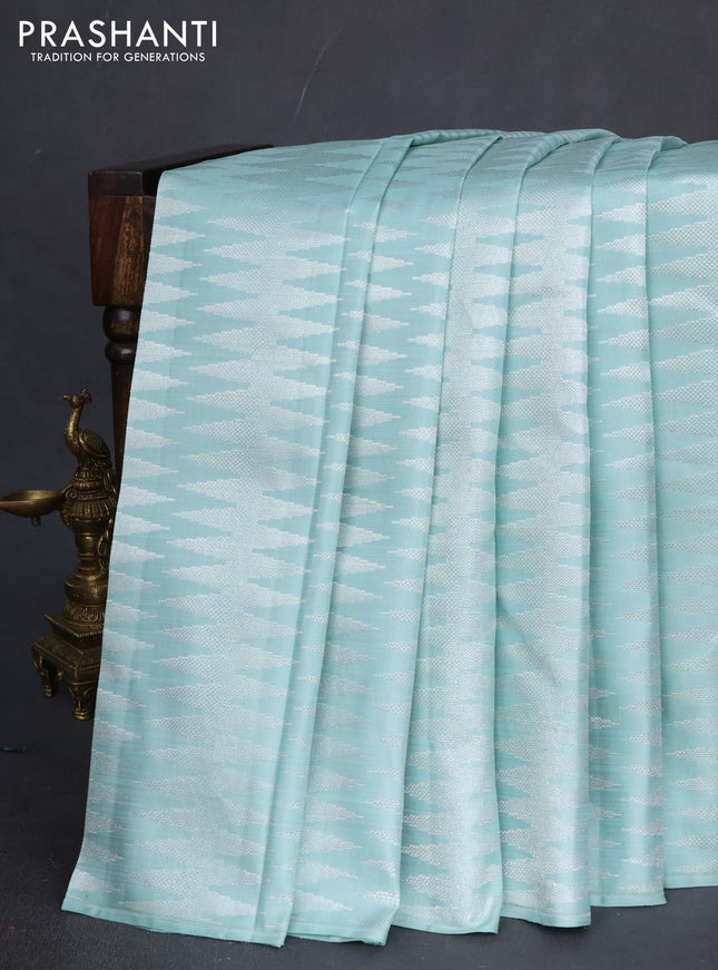 Pure kanchipuram silk saree pastel shade and purple with allover silver zari zig zag weaves in borderless style