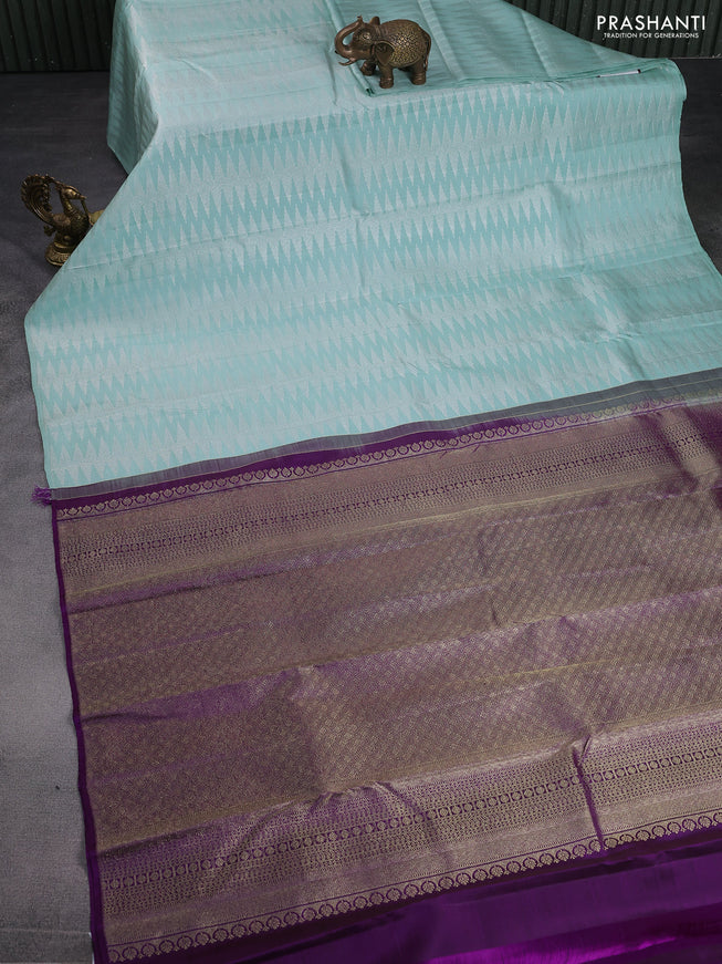 Pure kanchipuram silk saree pastel shade and purple with allover silver zari zig zag weaves in borderless style