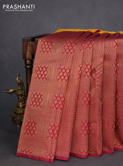 Pure kanchipuram silk saree mango yellow and maroon with half & half style and long zari woven border