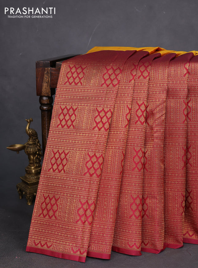 Pure kanchipuram silk saree mango yellow and maroon with half & half style and long zari woven border