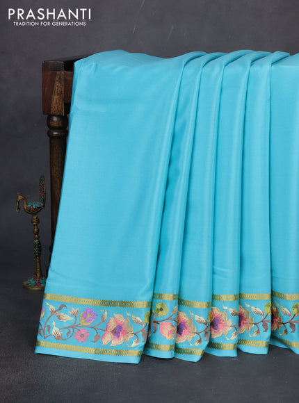Pure mysore crepe silk saree teal blue with plain body and zari woven embroidery work border