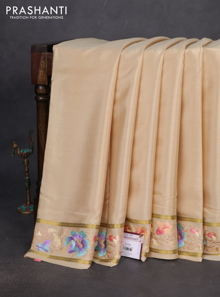 Pure mysore crepe silk saree cream with plain body and zari woven embroidery work border