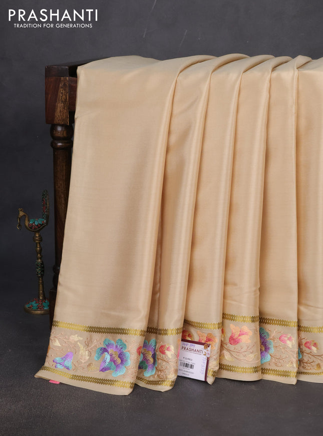 Pure mysore crepe silk saree cream with plain body and zari woven embroidery work border