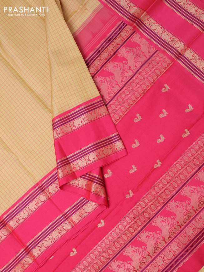 Pure kanchipuram silk saree pale yellow and pink with allover thread checks and rettapet thread woven border