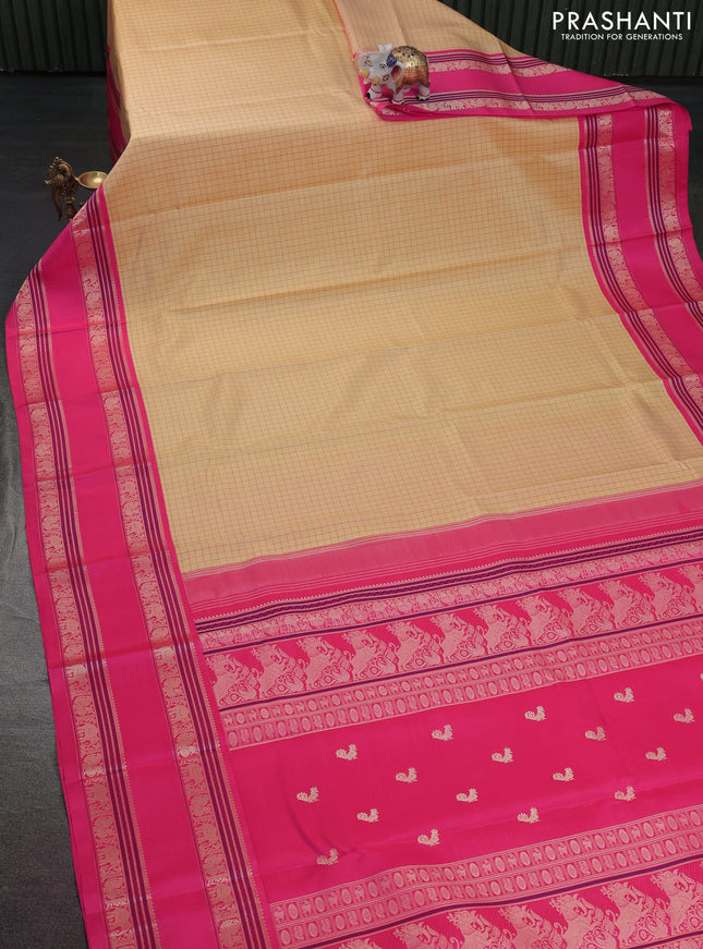 Pure kanchipuram silk saree pale yellow and pink with allover thread checks and rettapet thread woven border