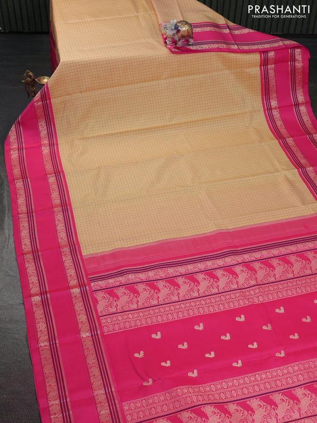 Pure kanchipuram silk saree pale yellow and pink with allover thread checks and rettapet thread woven border