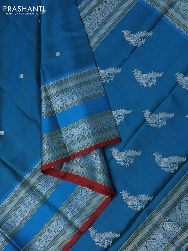 Pure kanchipuram silk saree dual shade of blue and red with thread woven buttas and long thread woven border