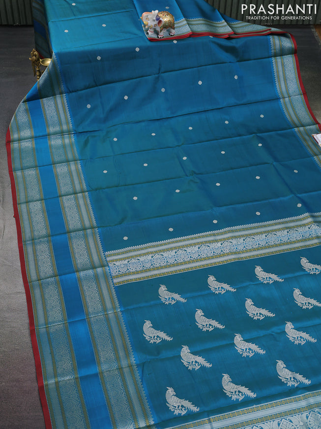 Pure kanchipuram silk saree dual shade of blue and red with thread woven buttas and long thread woven border