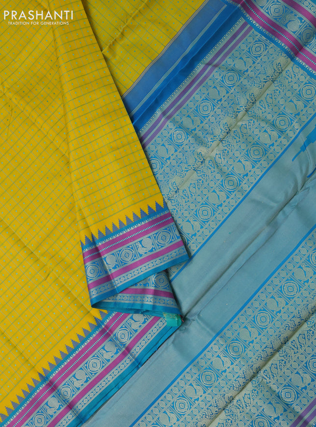 Pure kanchipuram silk saree yellow and dual shade of teal blue with allover thread checks & buttas and temple design thread woven border