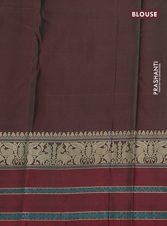 Pure kanchipuram silk saree dual shade of bluish green and maroon with thread woven buttas and thread woven border