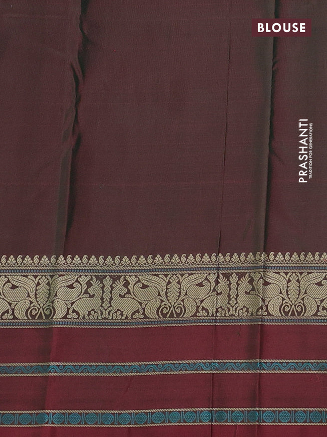 Pure kanchipuram silk saree dual shade of bluish green and maroon with thread woven buttas and thread woven border