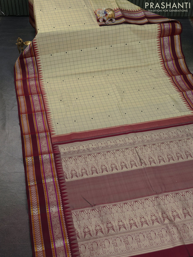 Pure kanchipuram silk saree cream and maroon with allover thread checks & buttas and temple design rettapet thread woven border