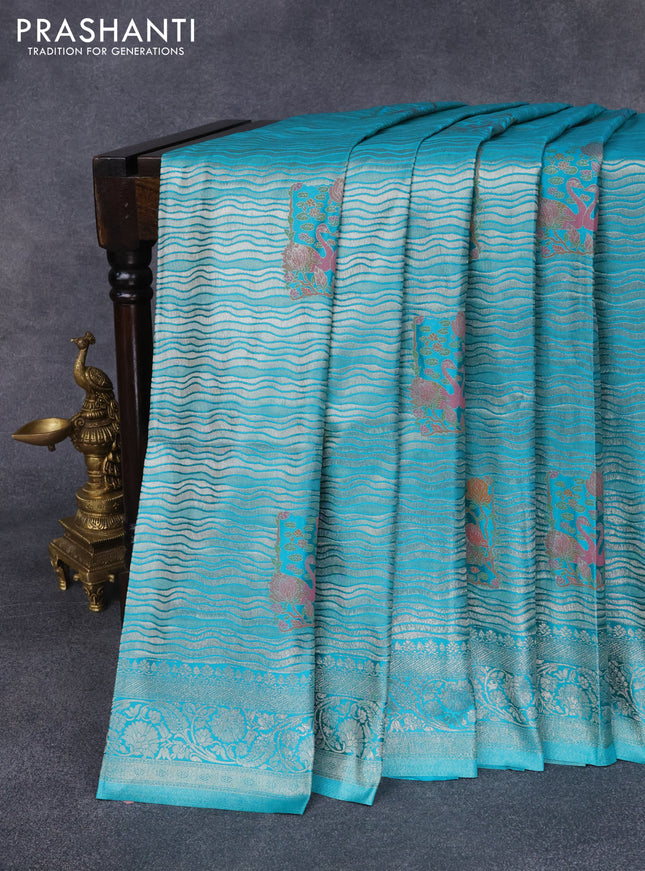 Banarasi silk saree teal blue with allover zari woven brocade weaves and zari woven border