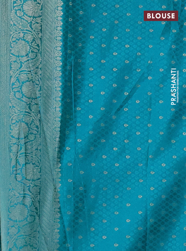 Banarasi silk saree teal blue with allover zari woven brocade weaves and zari woven border