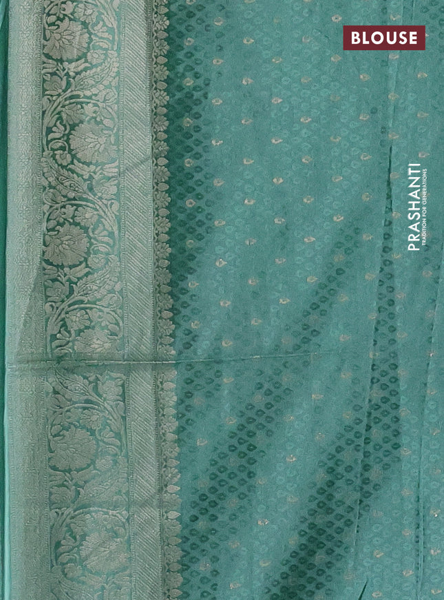 Banarasi silk saree pastel green with allover zari woven brocade weaves and zari woven border